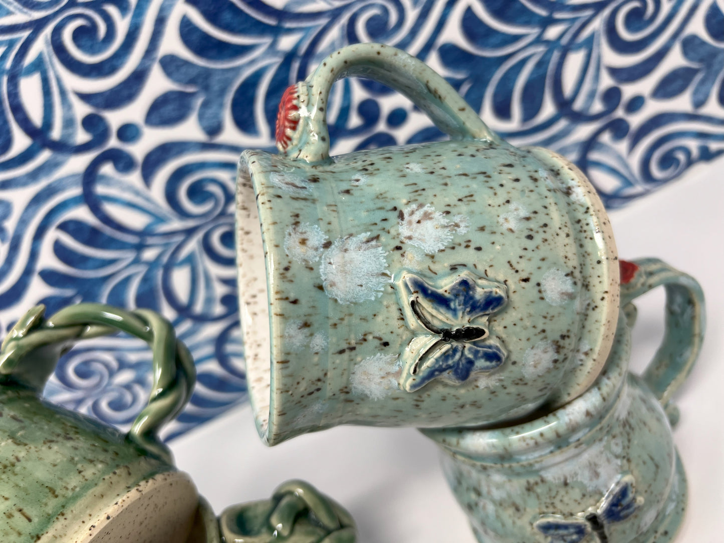 Coffee Mug | Handmade Pottery & Ceramics | Speckled Butterfly Mug with Floral Handle