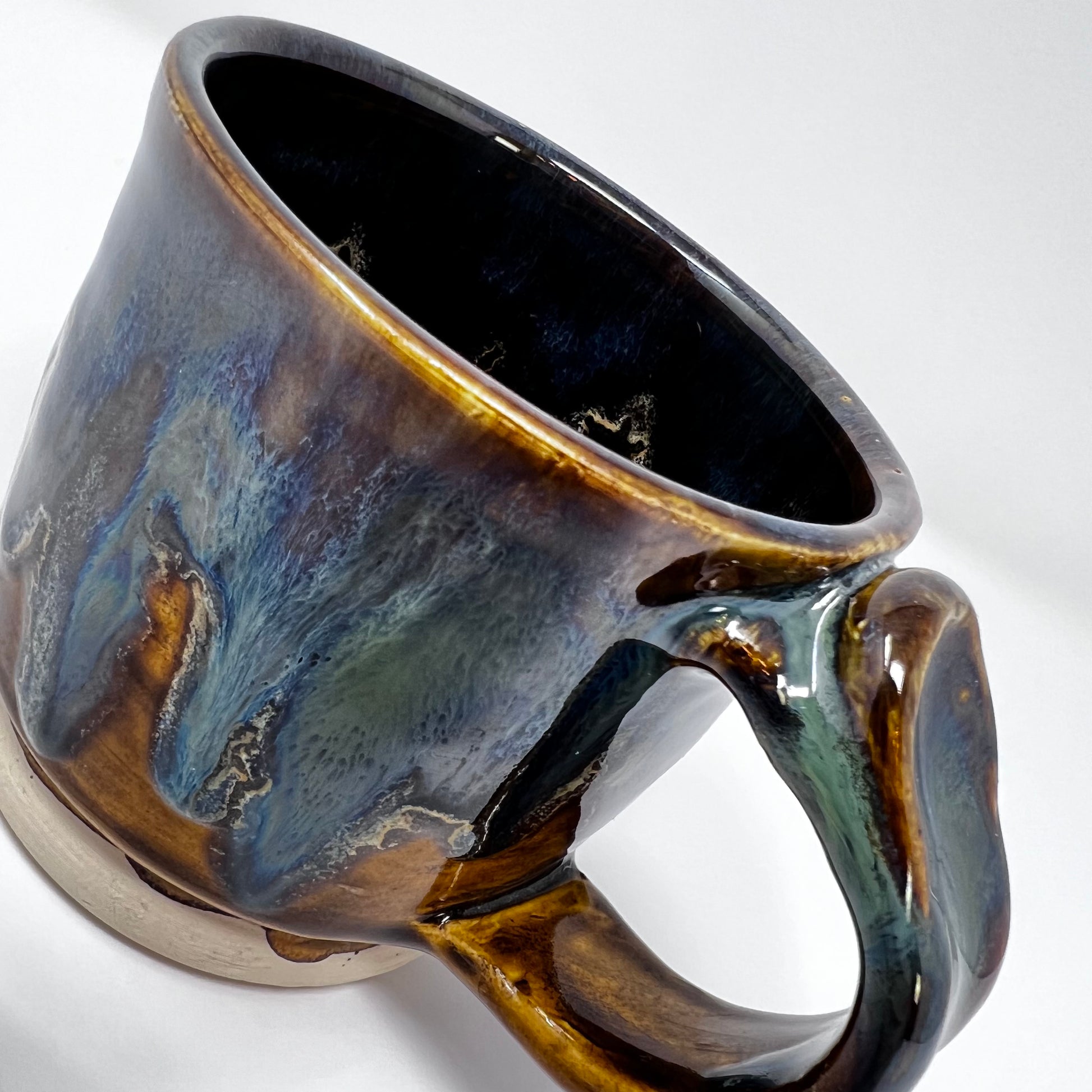 Handmade Ceramic Coffee Mug - Peacock Glazing with Accent Buttons - Enlarged Handle view