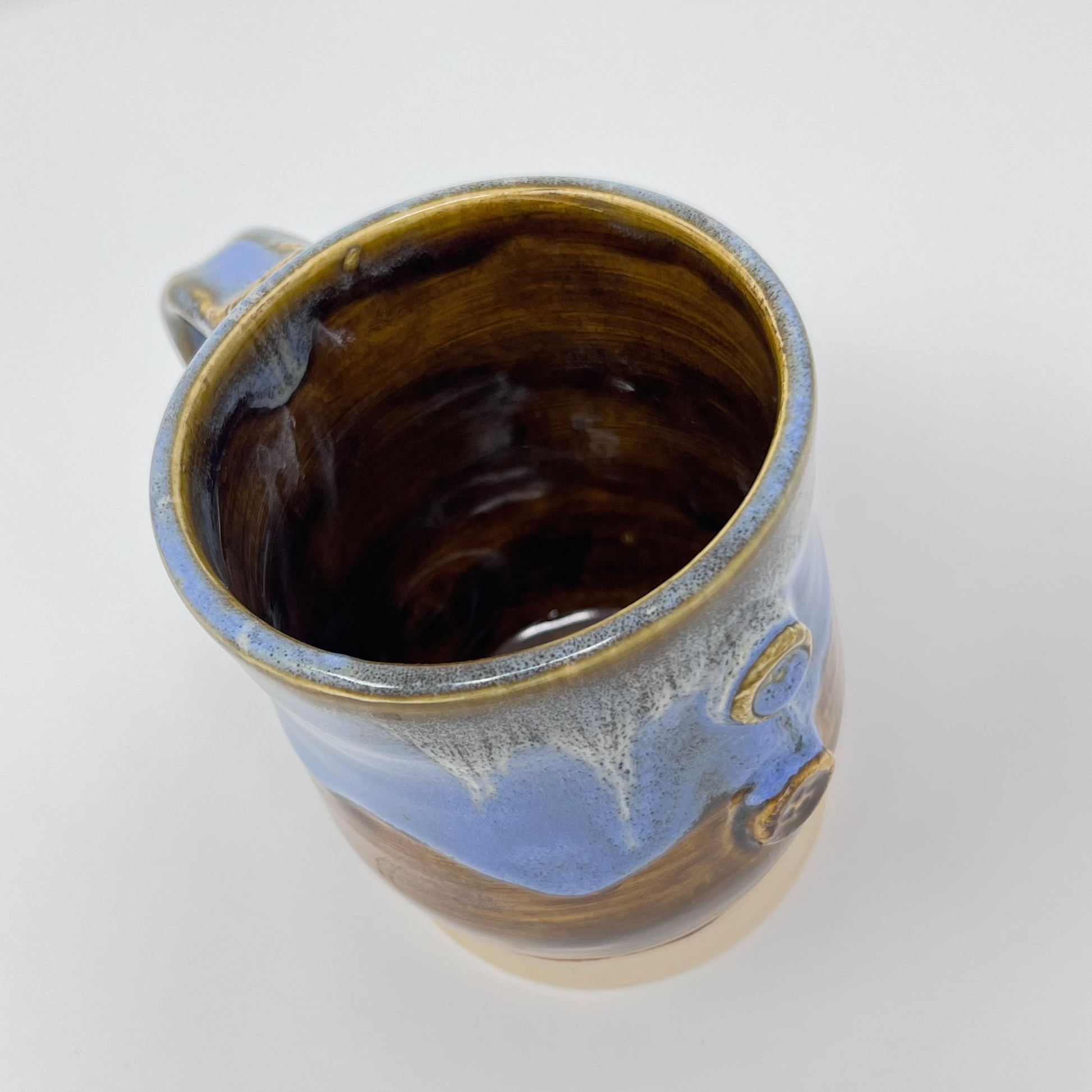 Handmade Ceramic Coffee Mug - Sky Blue Glazing with Accent Buttons - Inside view